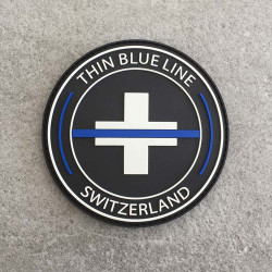 Badge rond "The Thin Blue Line Switzerland"