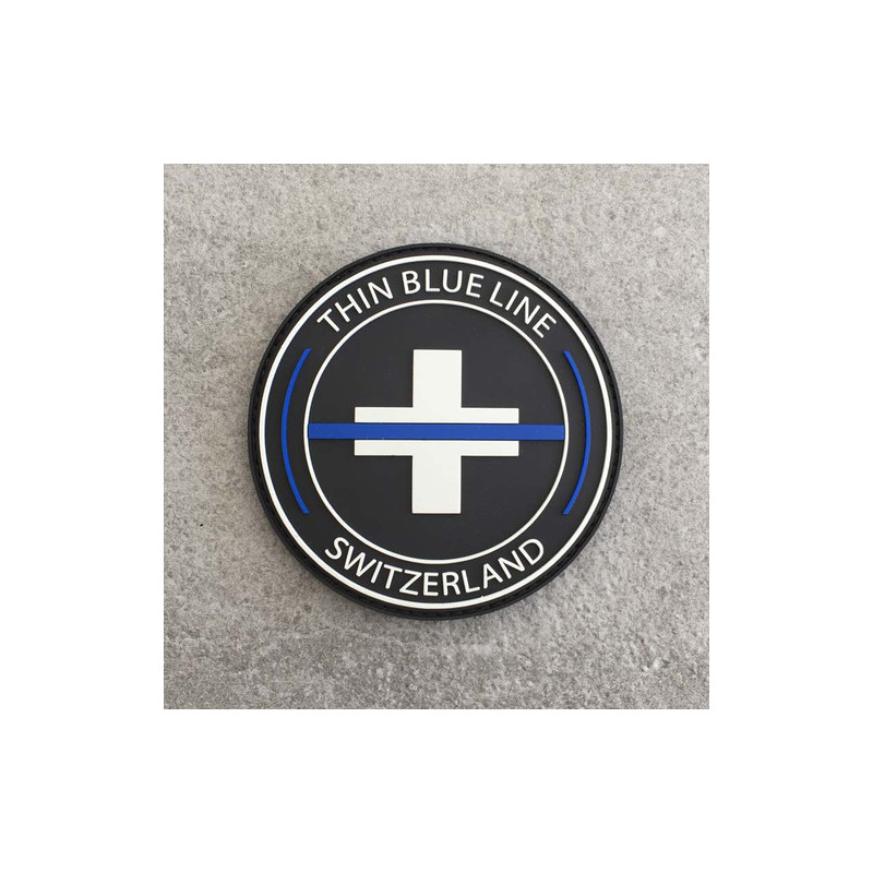 Badge rond "The Thin Blue Line Switzerland"